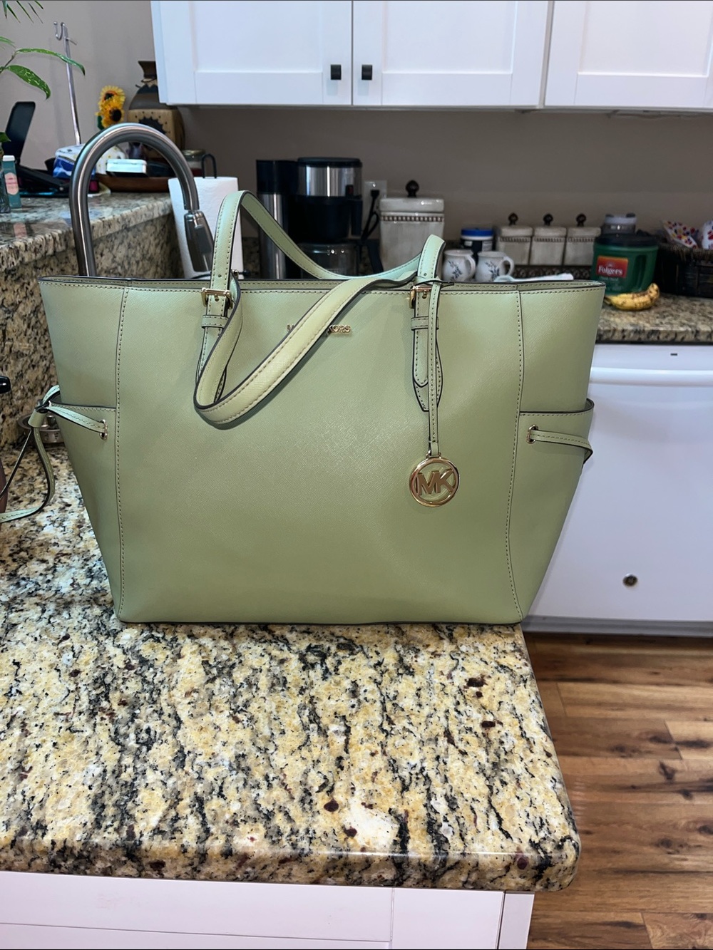 Like new Authentic Michael Kors Gilly Drawstring Top Zipper Tote.
